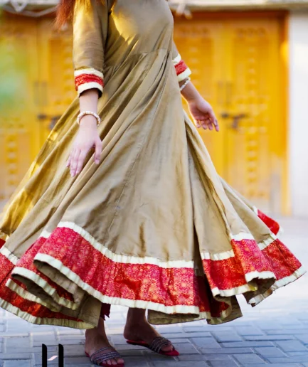 model wearing Gold & Red Silk Frock - Anarkali Style