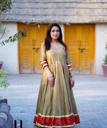 model wearing Gold & Red Silk Frock - Anarkali Style