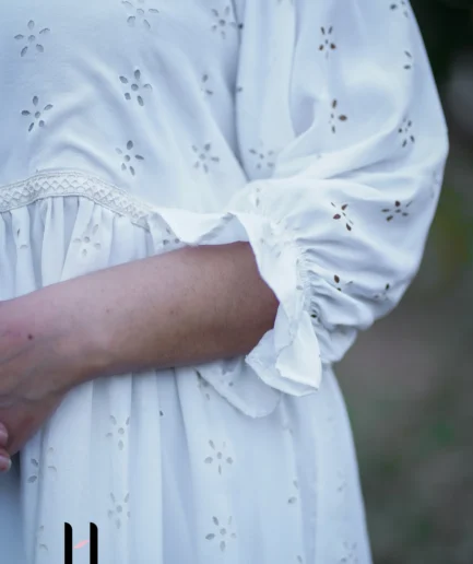 Model wearing white maxi in Pakistani style