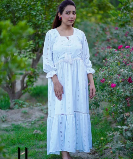 Model wearing white maxi in Pakistani style